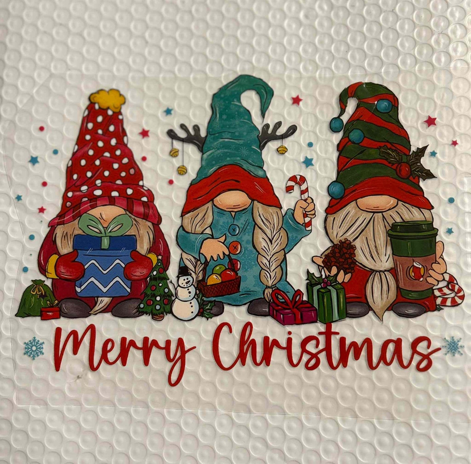 Holiday &amp; season design featuring festive Christmas gnomes with gifts.