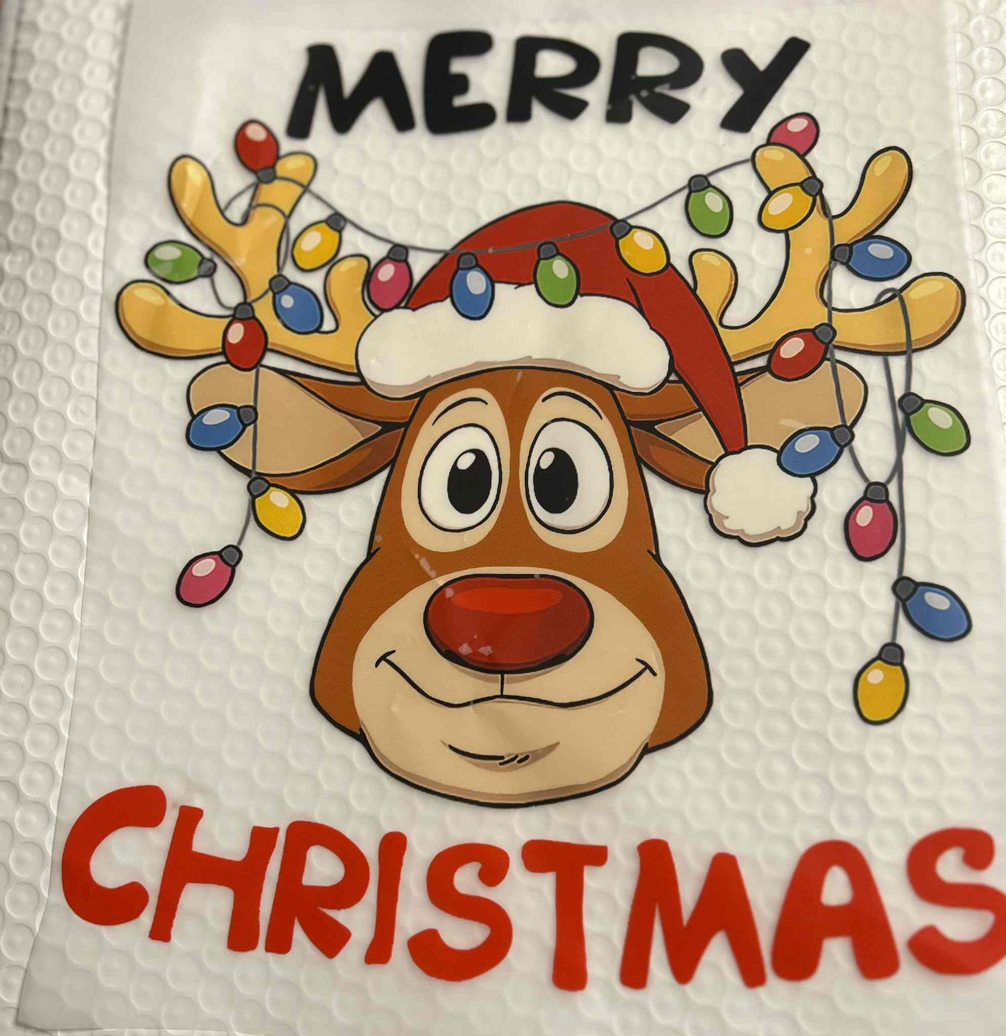 Merry Christmas reindeer design with colorful holiday lights for festive products.