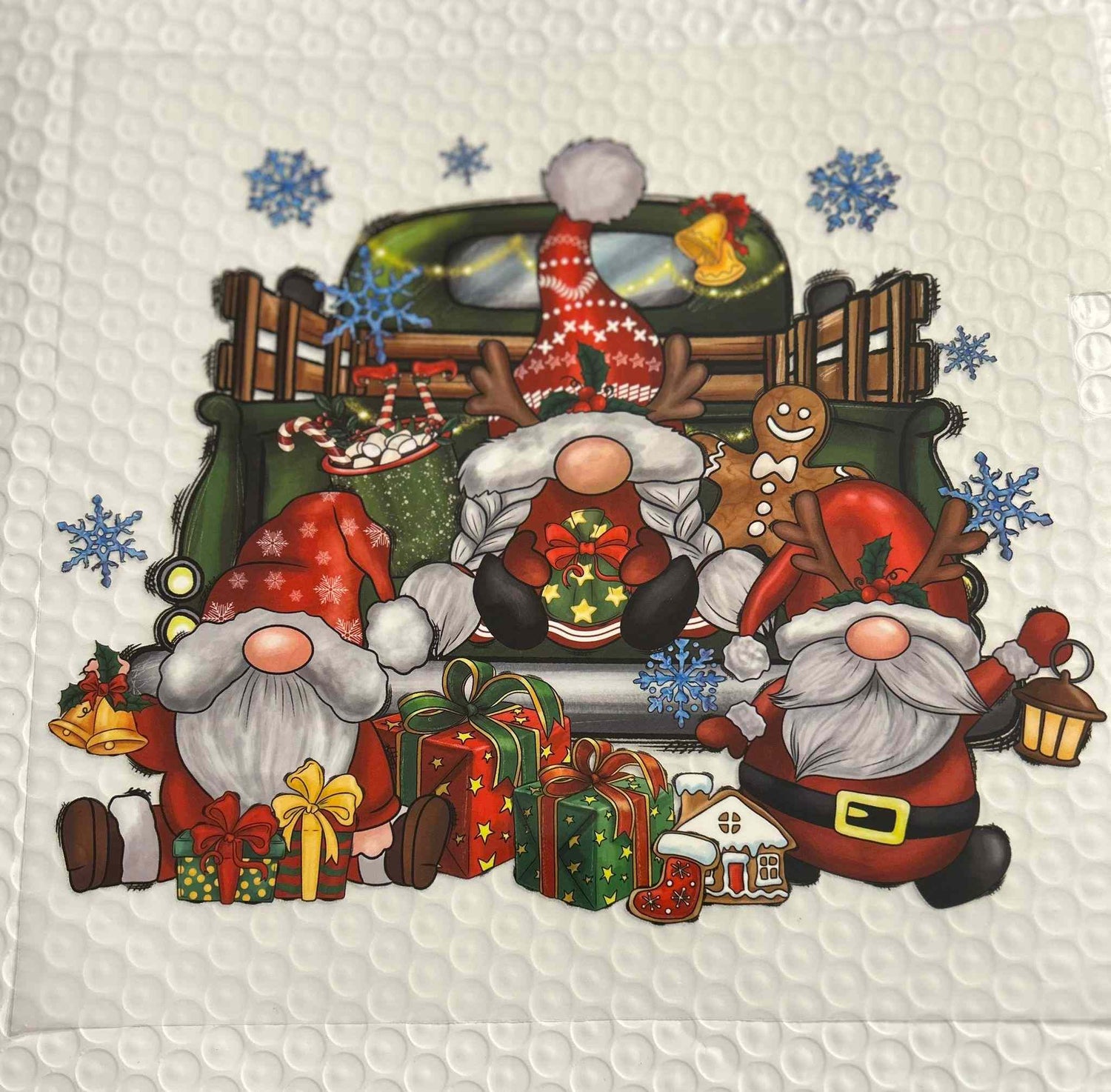 Festive holiday design with Christmas gnomes, gifts, and seasonal decorations.