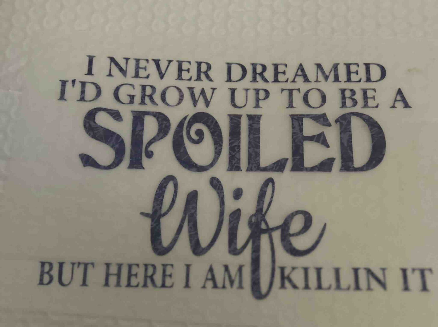 Spoiled wife saying design on textured background. cute quote designs