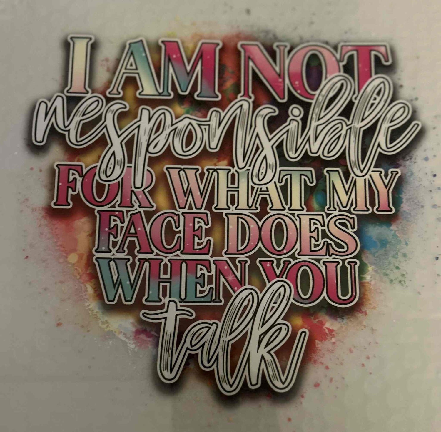 Colorful text design saying &quot;I am not responsible for what my face does when you talk&quot; with watercolor background. cute quote designs