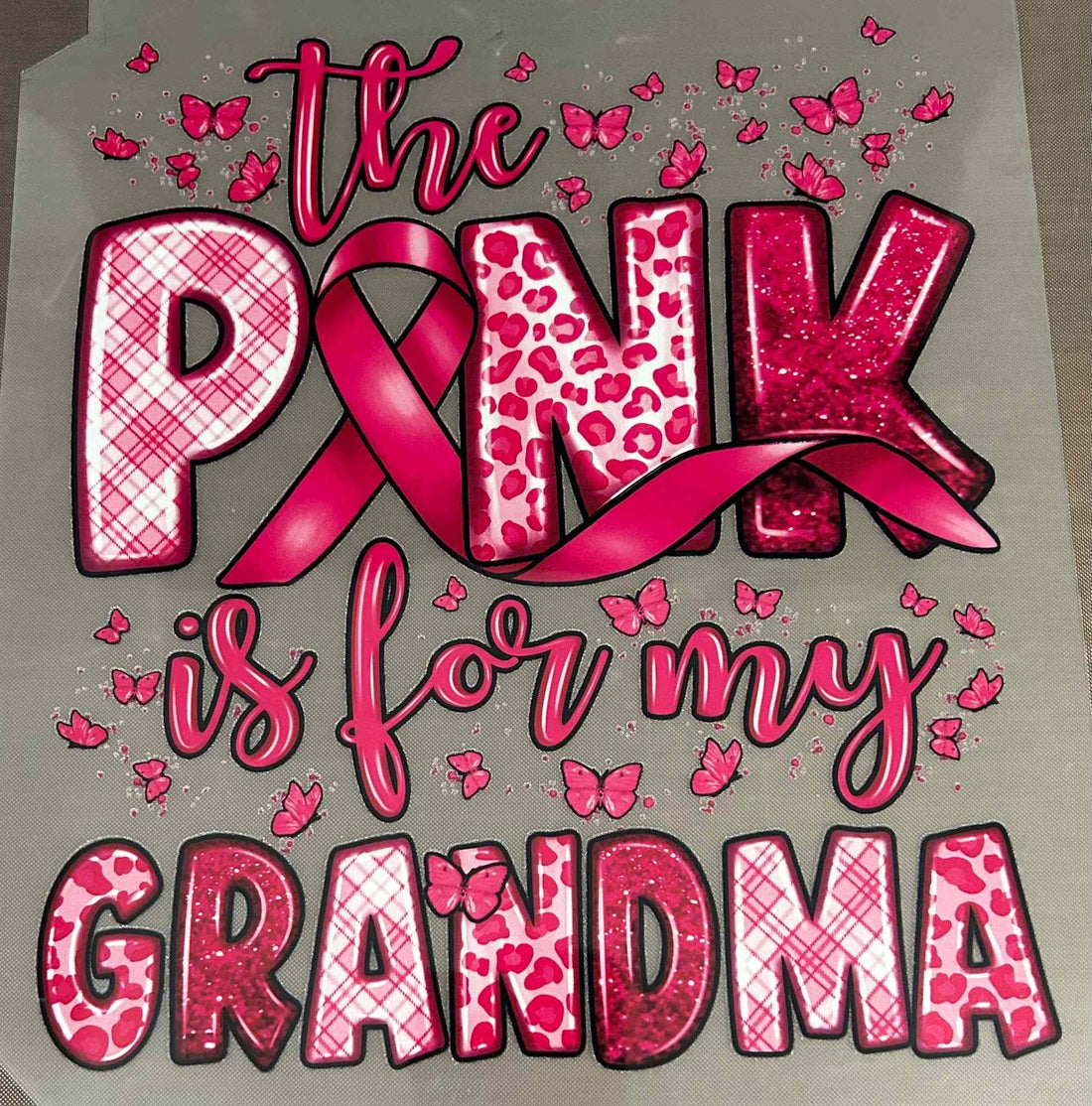 Miscellaneous Designs with pink ribbon and butterfly theme advocating for grandma.