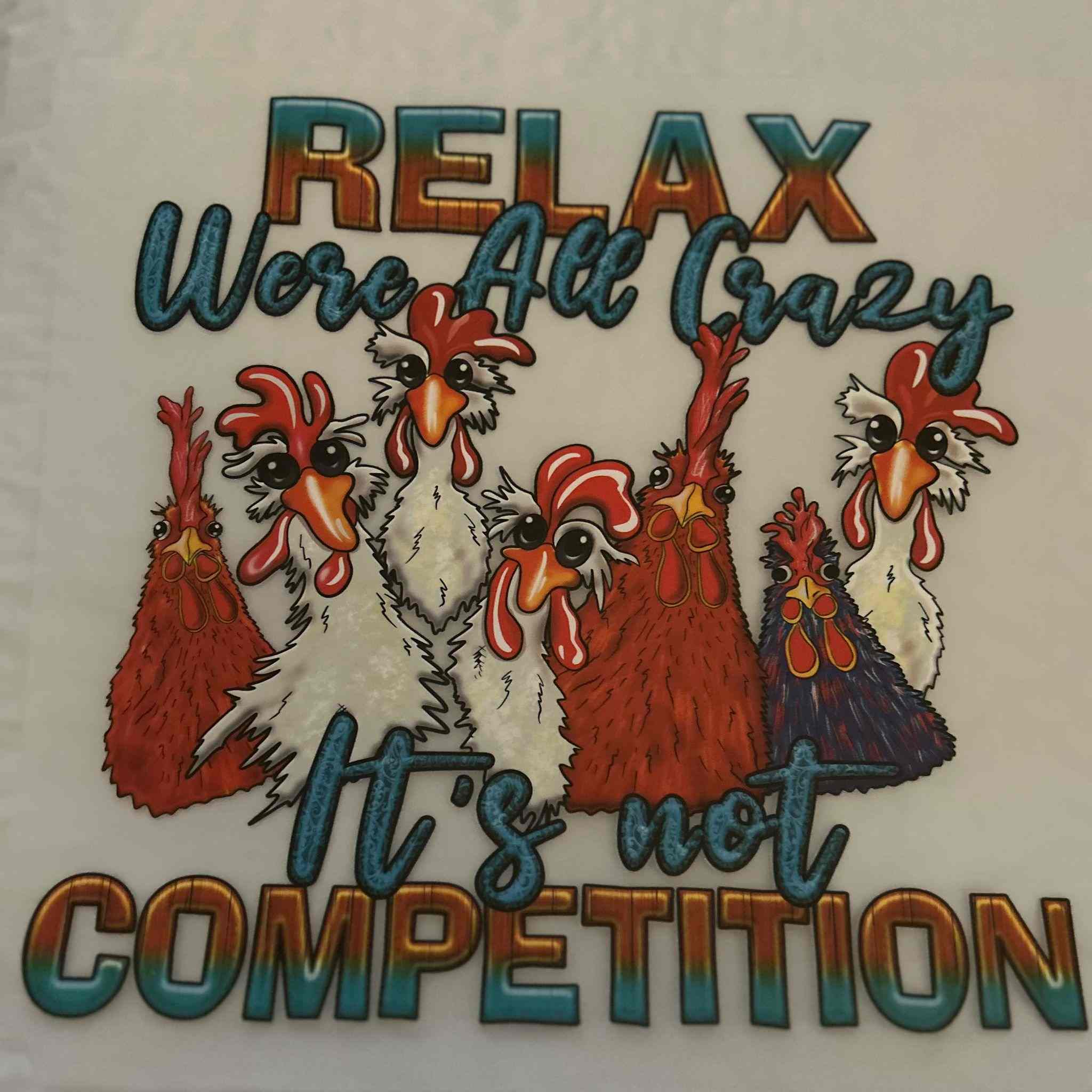 Animal Designs shirt with colorful chicken graphics and text &quot;Relax We&