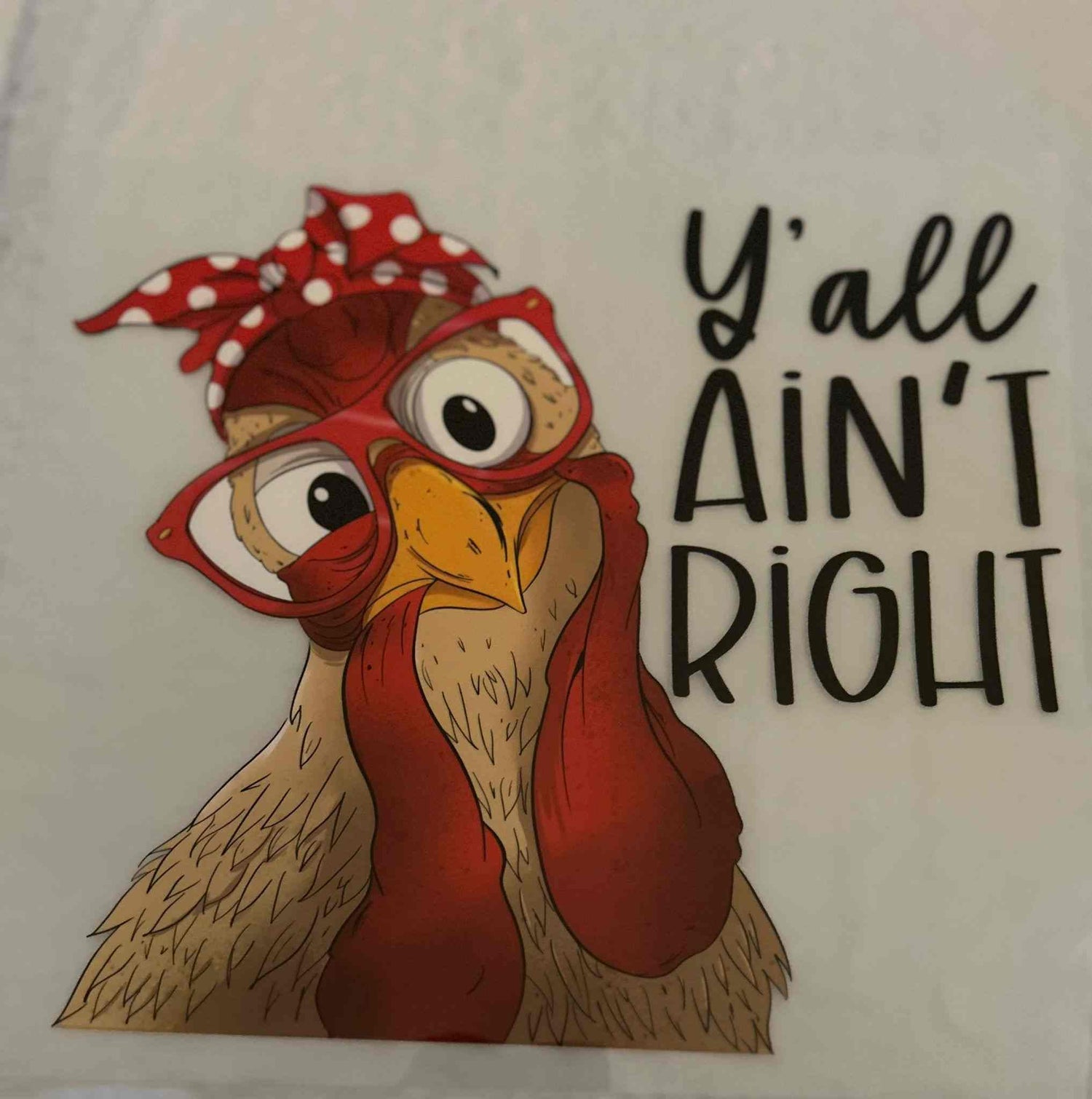 Cartoon chicken with red glasses and scarf, &quot;Y&