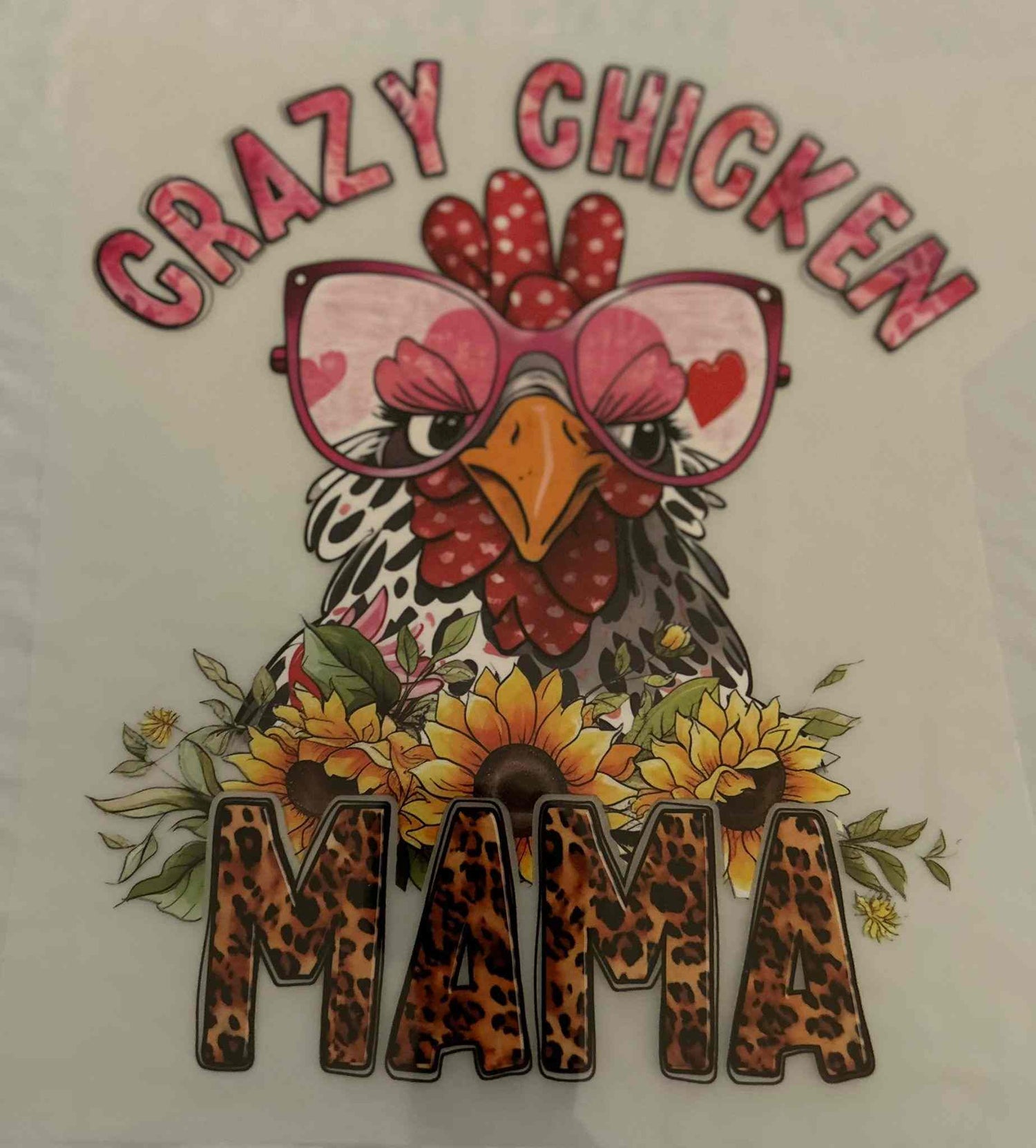 Crazy chicken design with glasses and sunflowers, featuring text &quot;Crazy Chicken Mama&quot;.