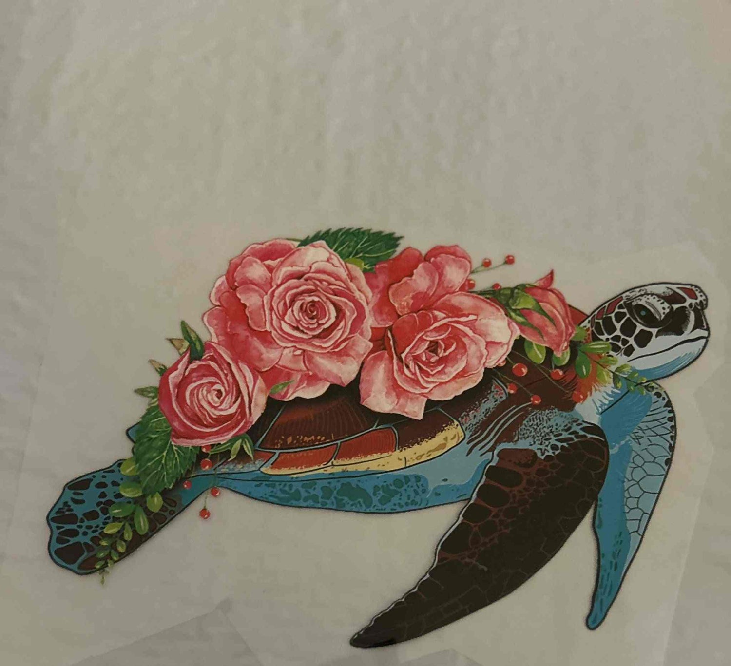 Sea turtle with floral design showcasing intricate animal patterns.