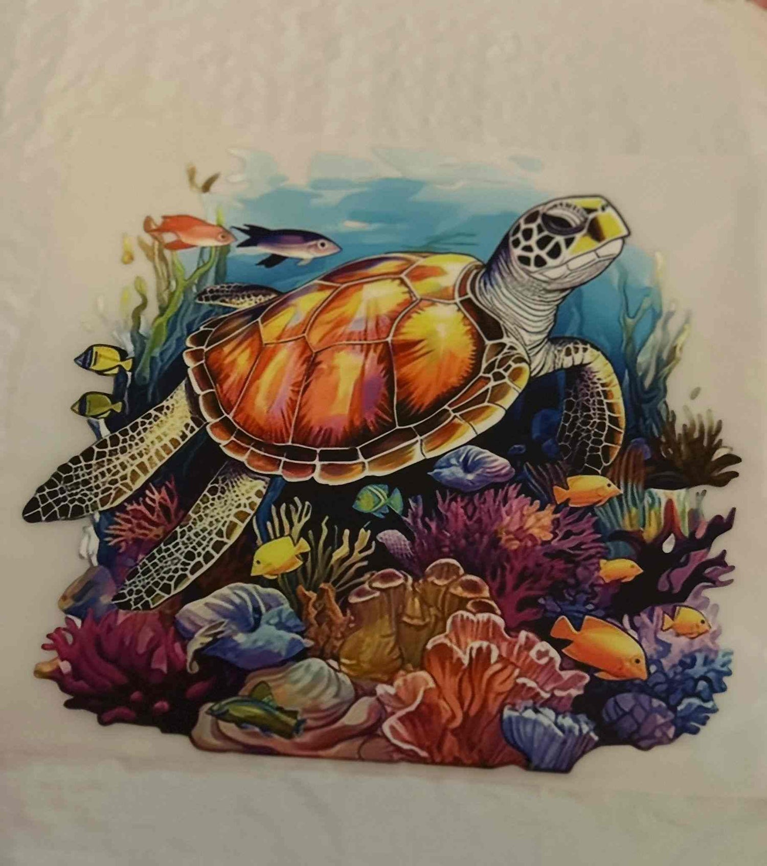 Intricate animal design with a vibrant sea turtle and coral reef pattern.