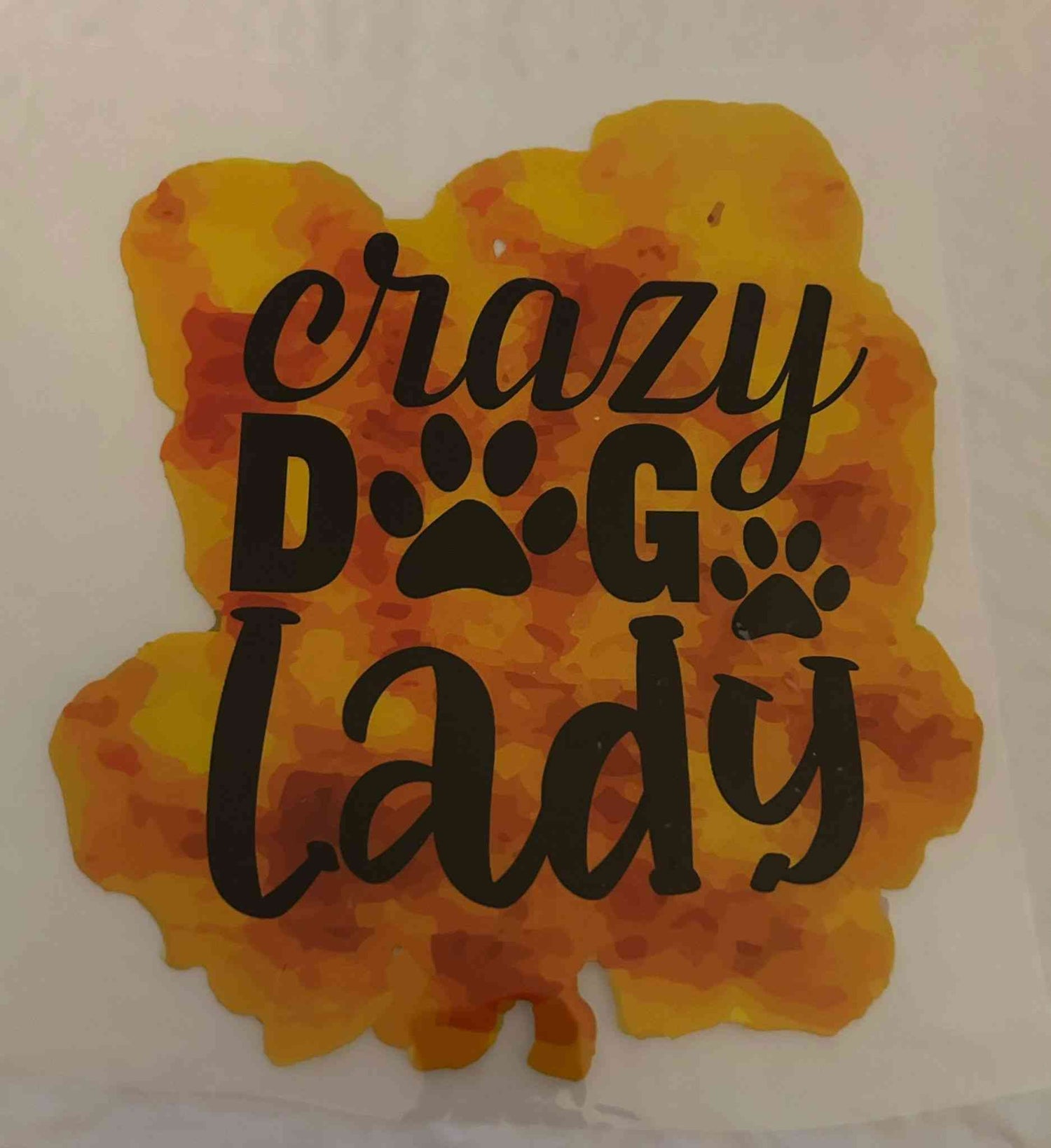 Animal Design with &quot;Crazy Dog Lady&quot; text and paw prints on an orange and yellow background.