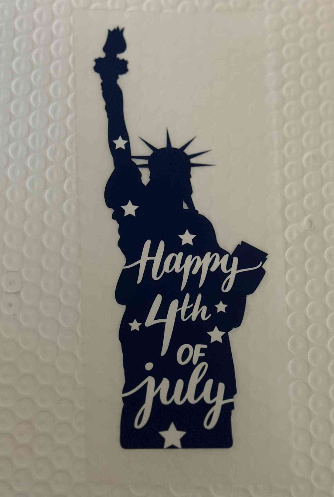 Holiday &amp; Season design featuring &quot;Happy 4th of July&quot; with the Statue of Liberty silhouette.