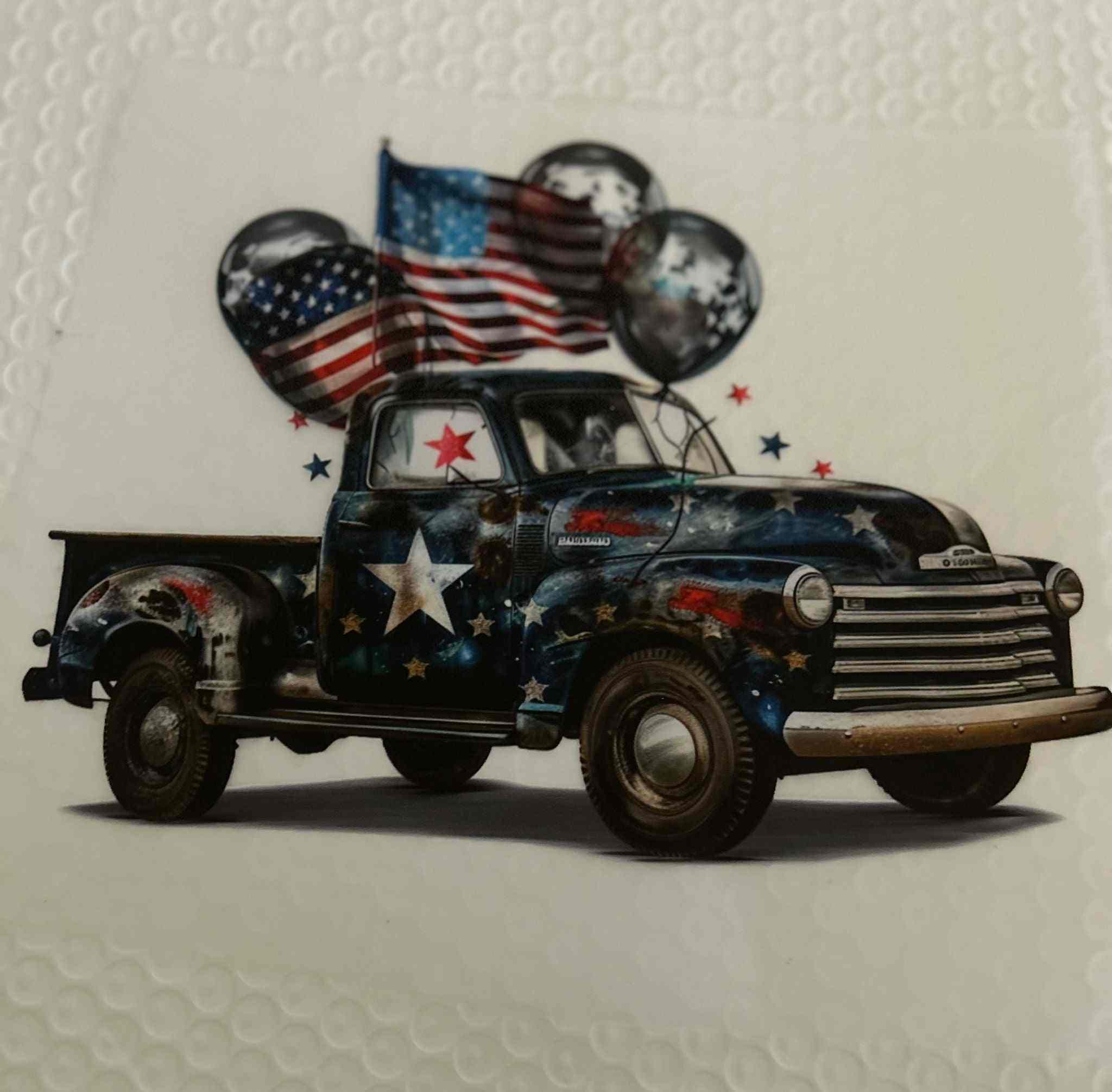 vintage truck with patriotic design and American flags