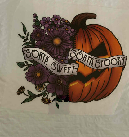 Holiday &amp; Season design featuring a pumpkin with floral accents and &quot;Sorta Sweet Sorta Spooky&quot; text.