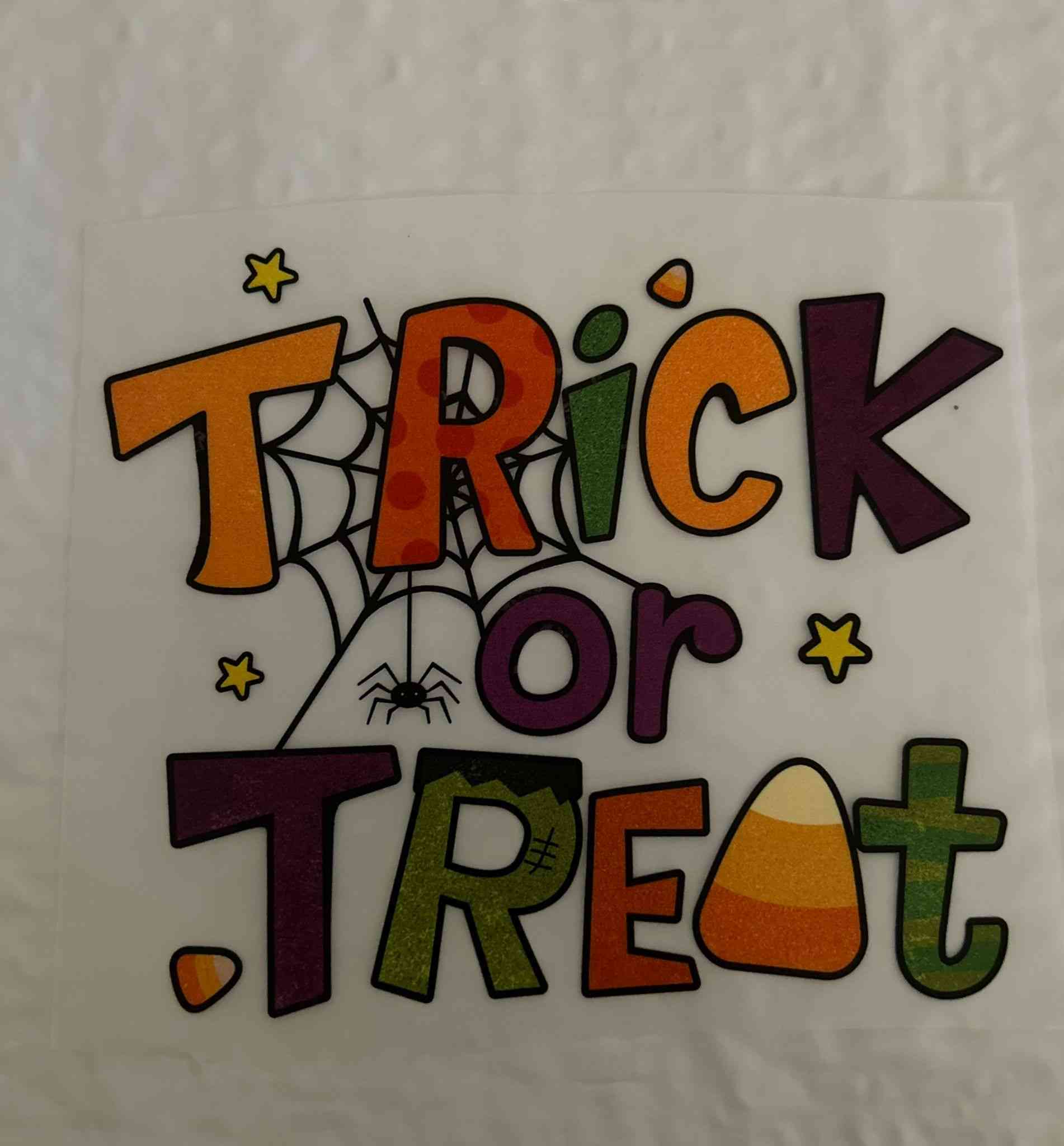 Trick or Treat holiday sticker design with festive Halloween theme.