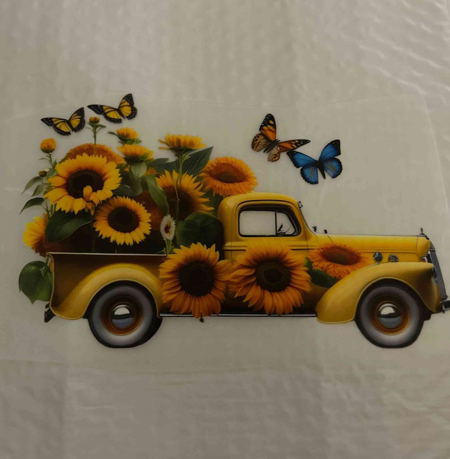 Yellow truck with sunflowers and butterflies holiday &amp; season design.