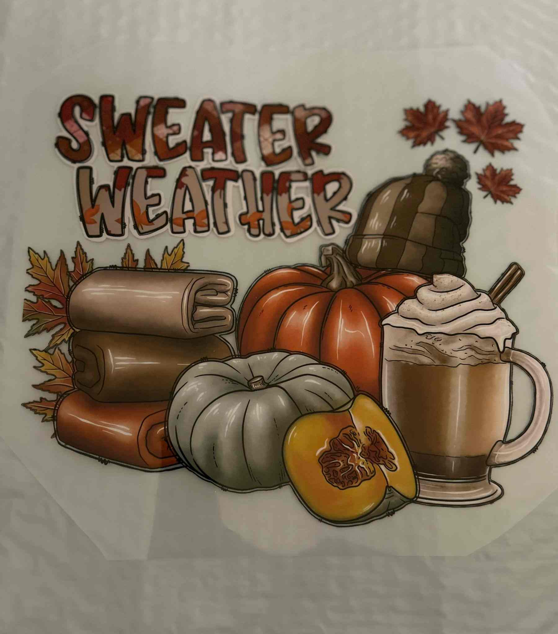 Sweater weather holiday &amp; season design with autumn leaves, pumpkins, blankets, and a hot drink.