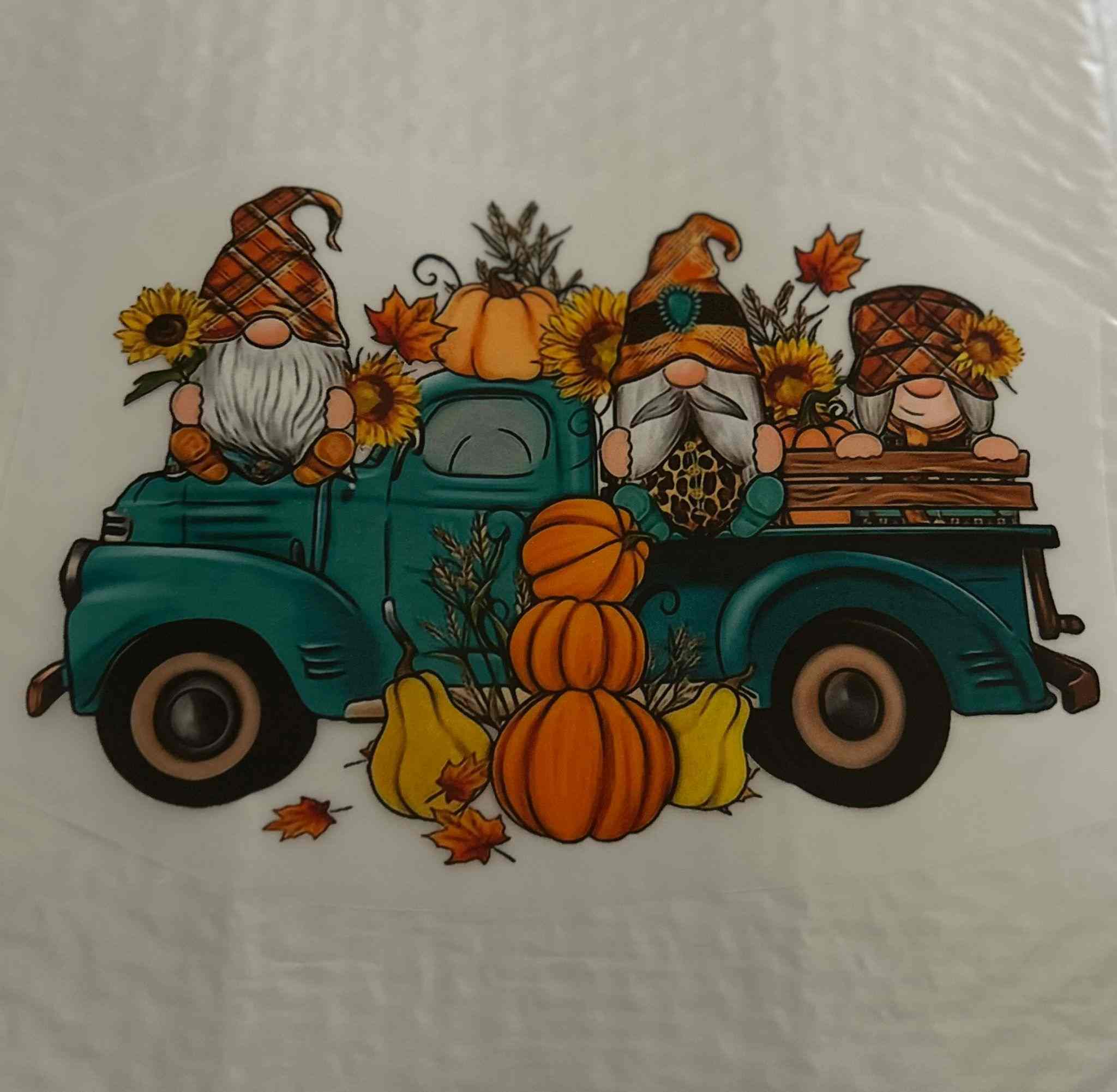 Holiday and season design featuring gnomes and pumpkins in a vintage truck.