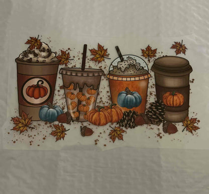 Holiday and seasonal design with festive pumpkin coffee cups and autumn leaves.