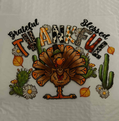 Colorful Thanksgiving turkey design with fall leaves, daisies, and cacti for holiday &amp; season decor.