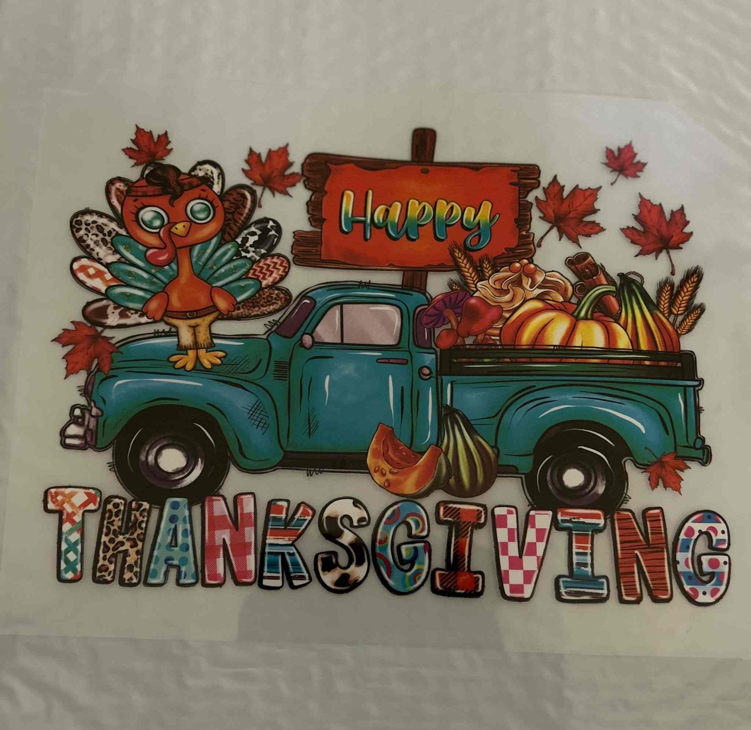 Thanksgiving holiday design with turkey and autumn leaves on a vintage truck.